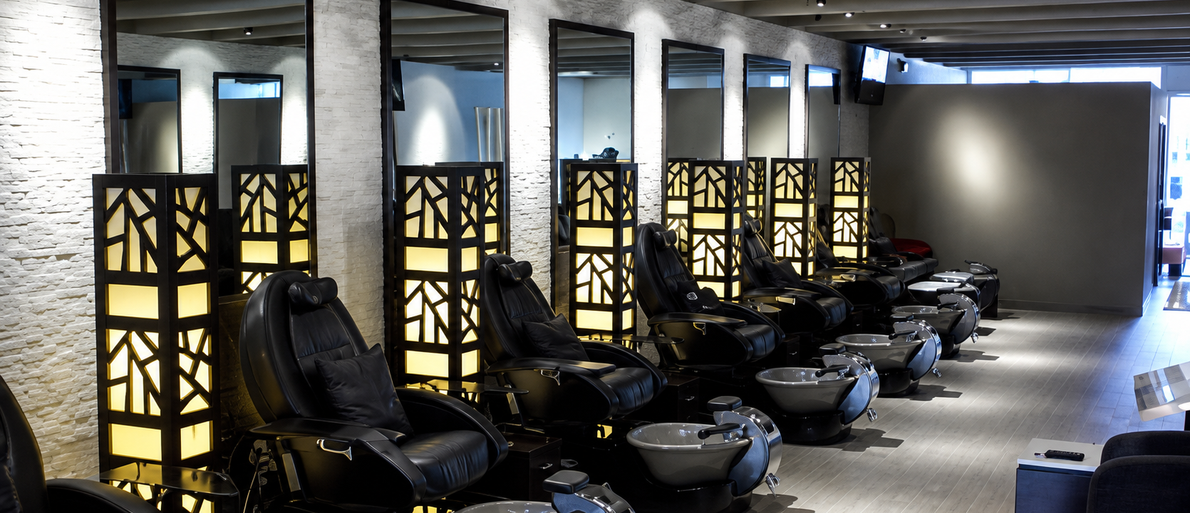 Modern pedicure station with individual basins and seating