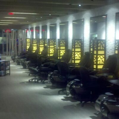 Focused ceiling lighting highlighting salon work areas