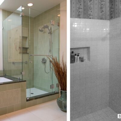 Separate soaking tub surrounded by coordinated tile and dark green stone.