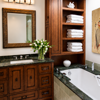 Bright, open view of the remodeled bathroom showing new lighting.