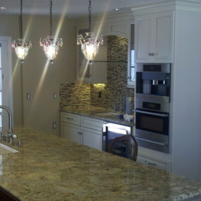 Overall kitchen view highlighting design harmony and freshness.