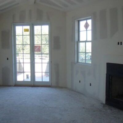 Welcoming entrance with updated doors and architectural features