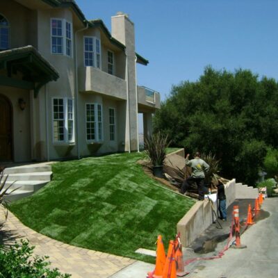 Landscaped garden area surrounding the newly renovated home